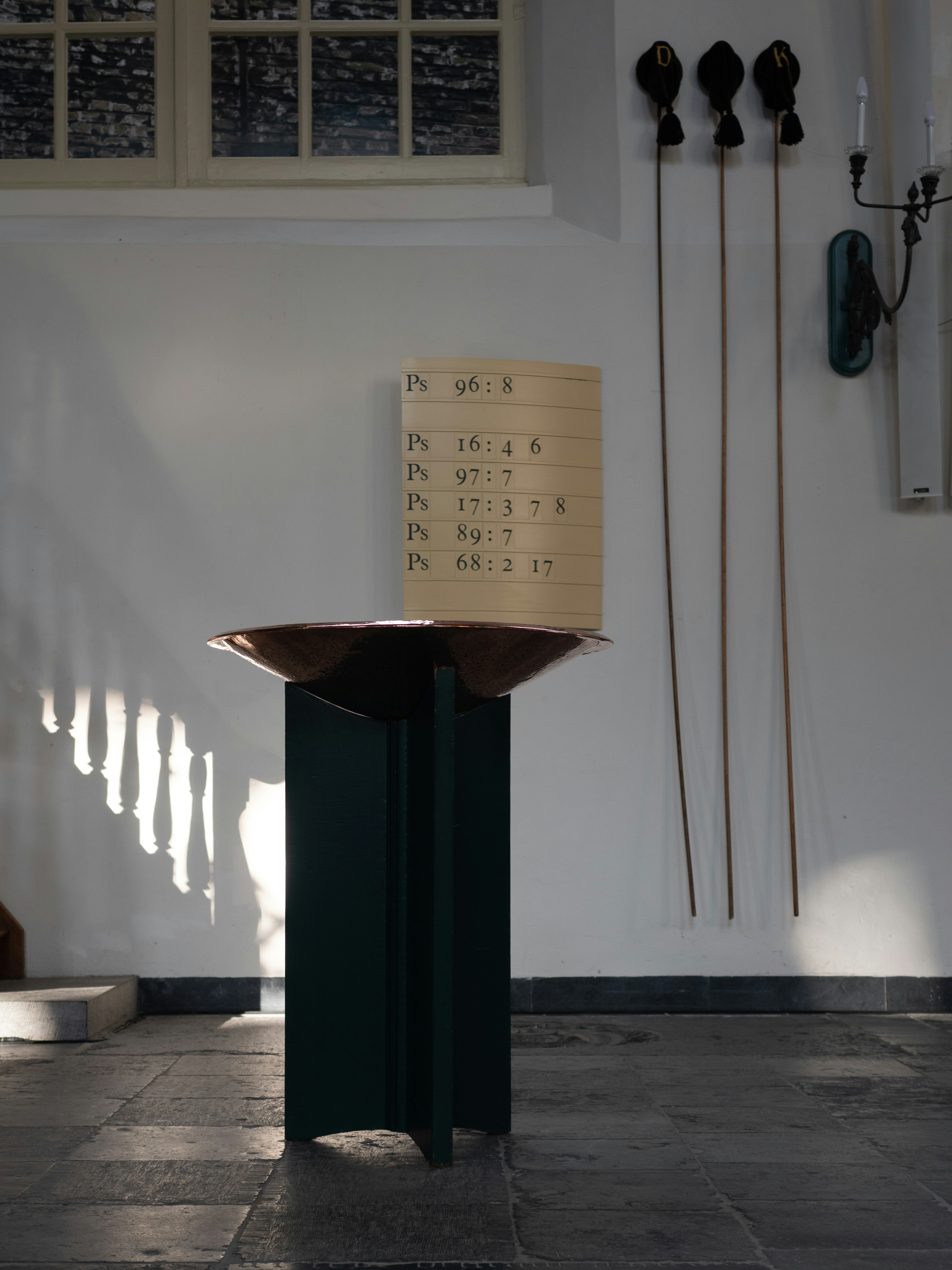 a room with a table and a clock on the wall