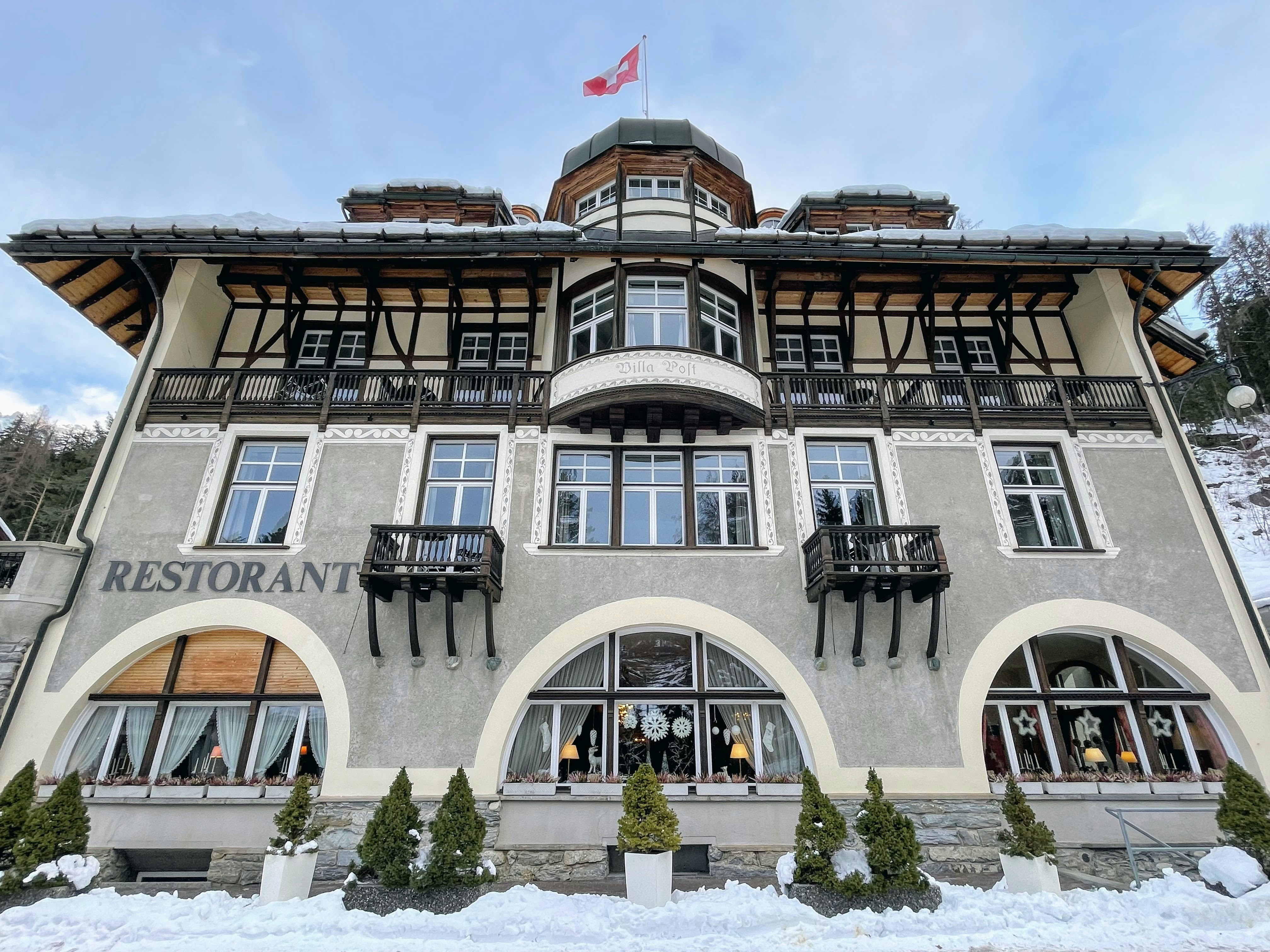 The warm interior of a traditional Swiss mountain restaurant — a good rainy-day refuge