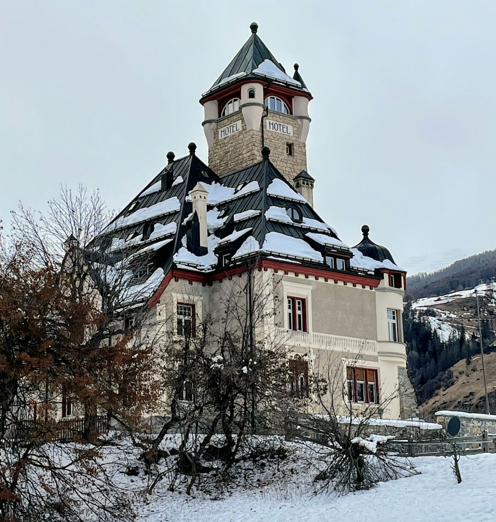 a large building with a clock on the top of it