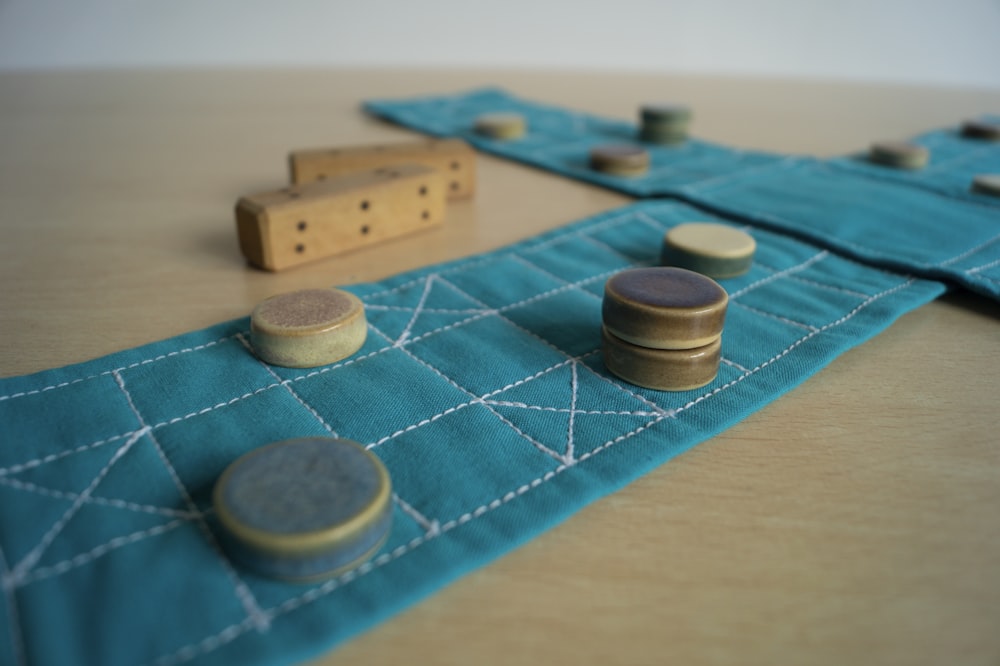 a close up of a table with buttons and a piece of cloth