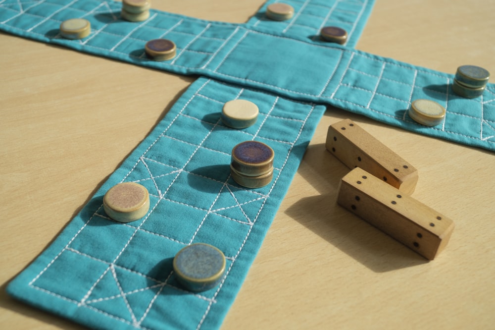 a close up of a game of dominos on a table