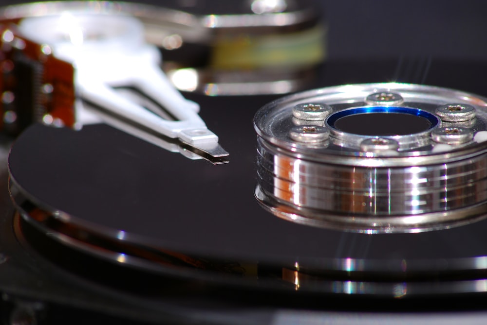 a close up of a disc with a toothbrush on top of it