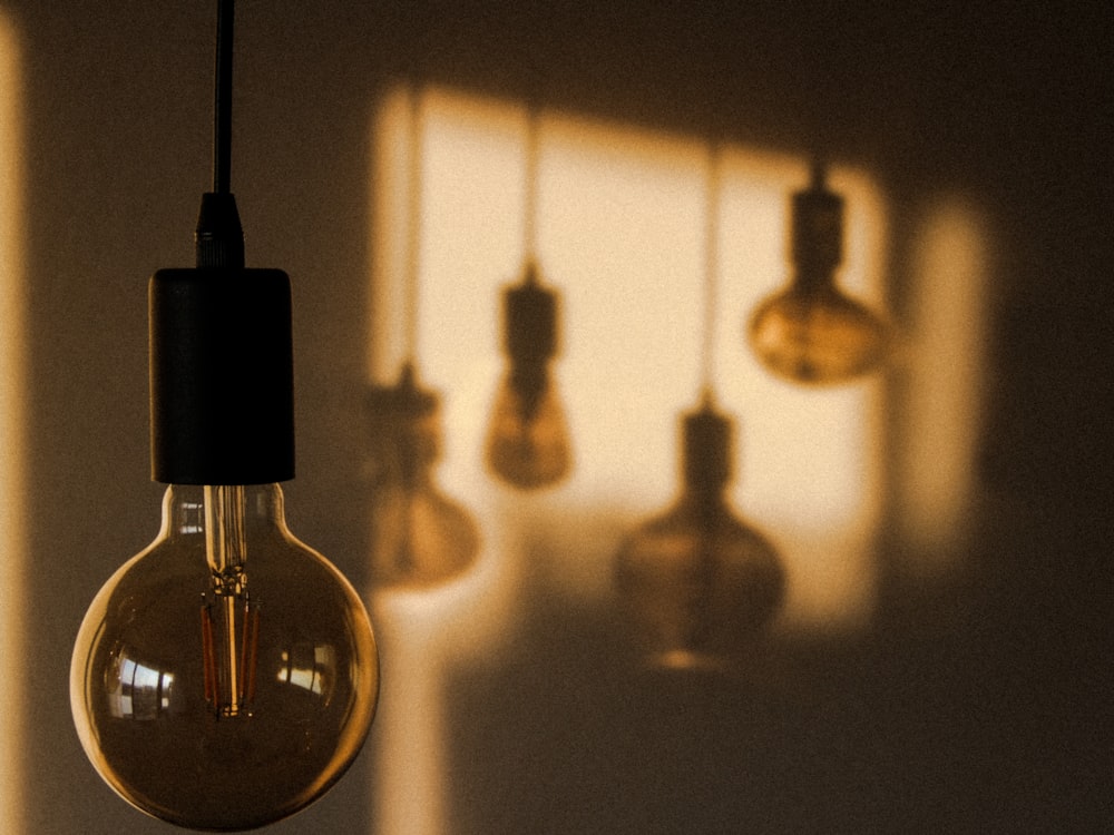 a group of light bulbs hanging from a ceiling