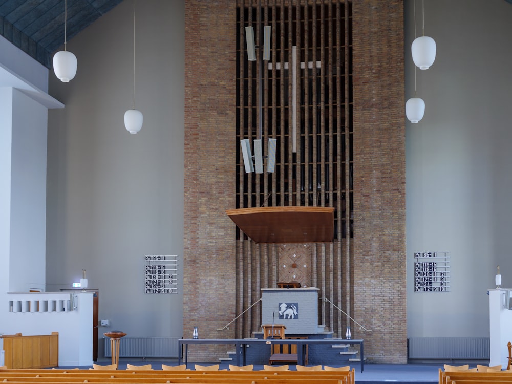 a church with pews and a clock on the wall