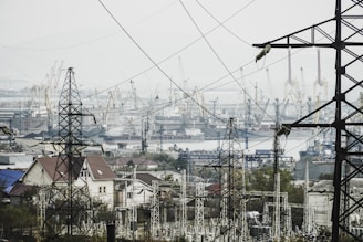 a view of a city with lots of power lines
