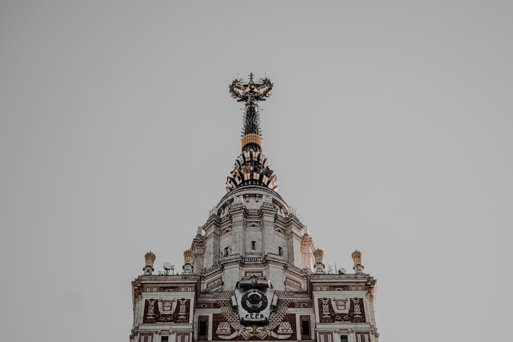 a tall building with a clock on the top of it