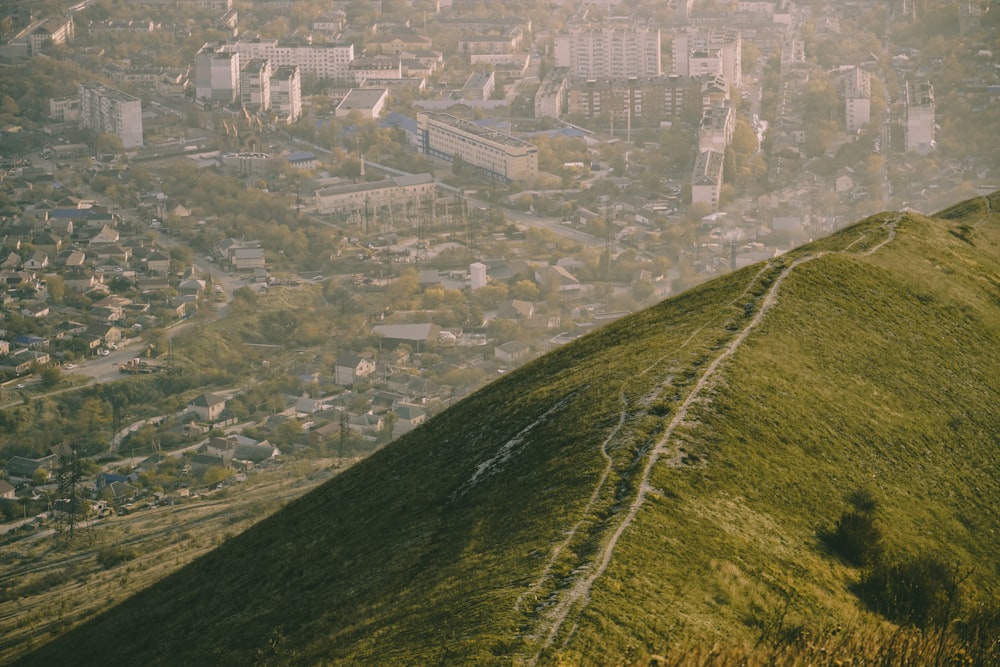 a view of a city from the top of a hill