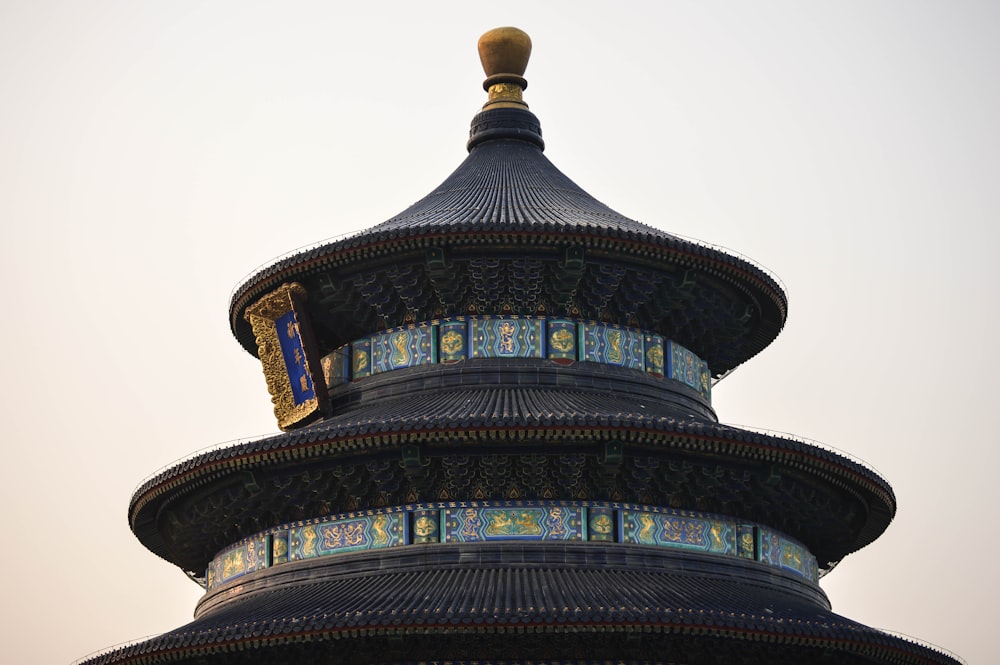 a tall tower with a clock on top of it