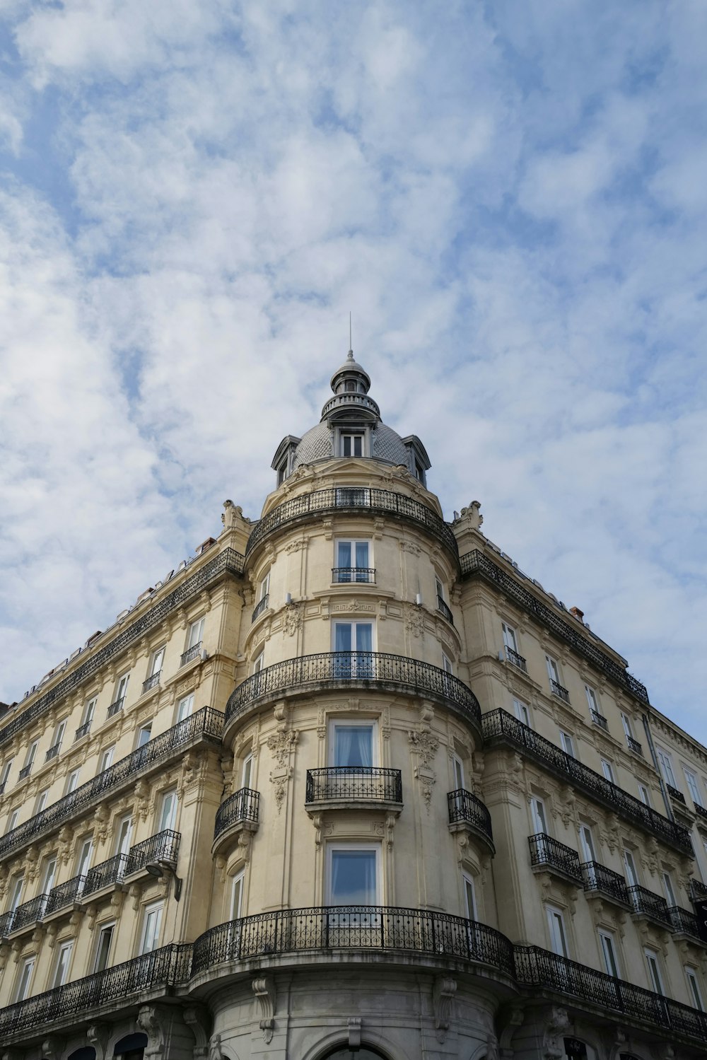 a tall building with a clock on the top of it