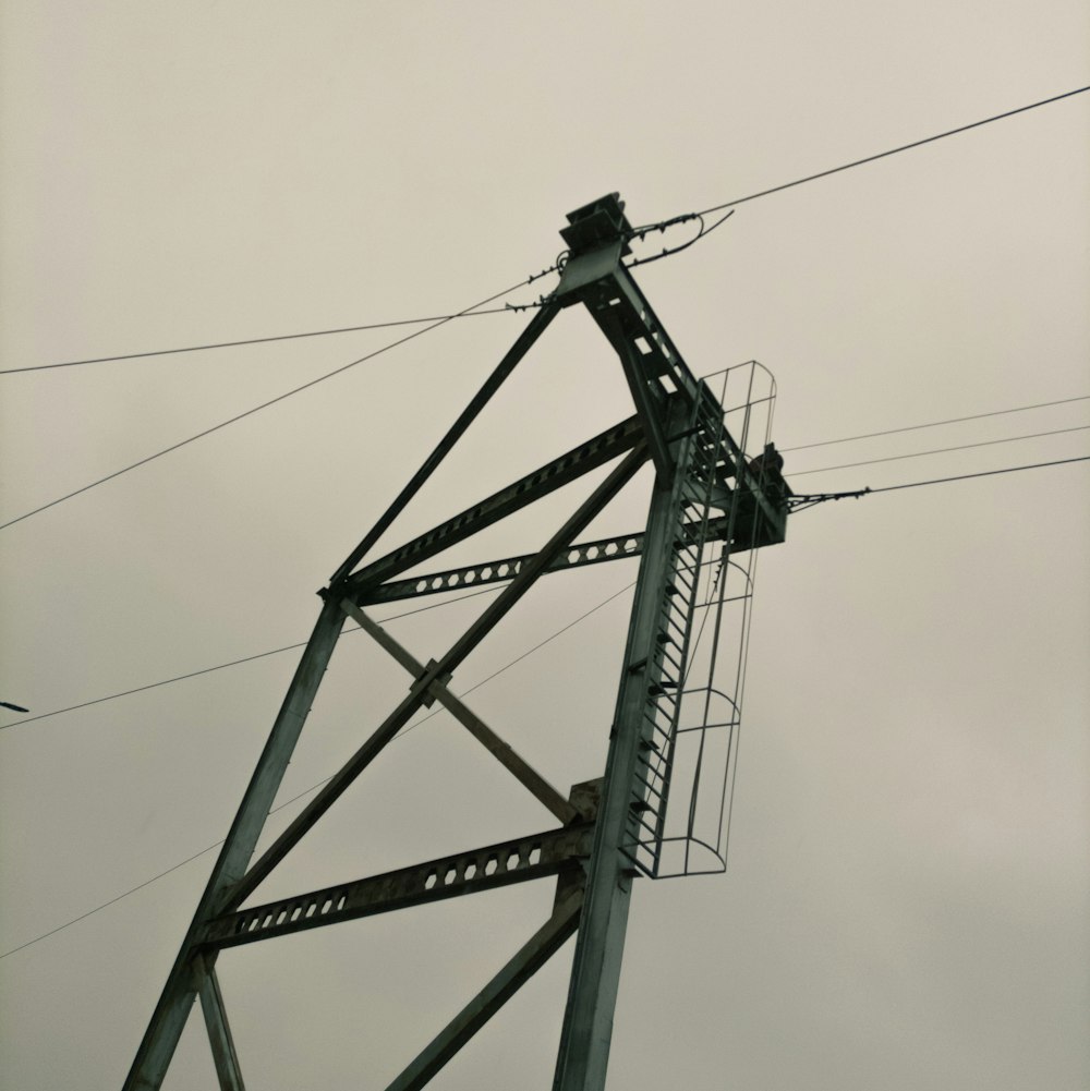 a close up of a power line with a sky background