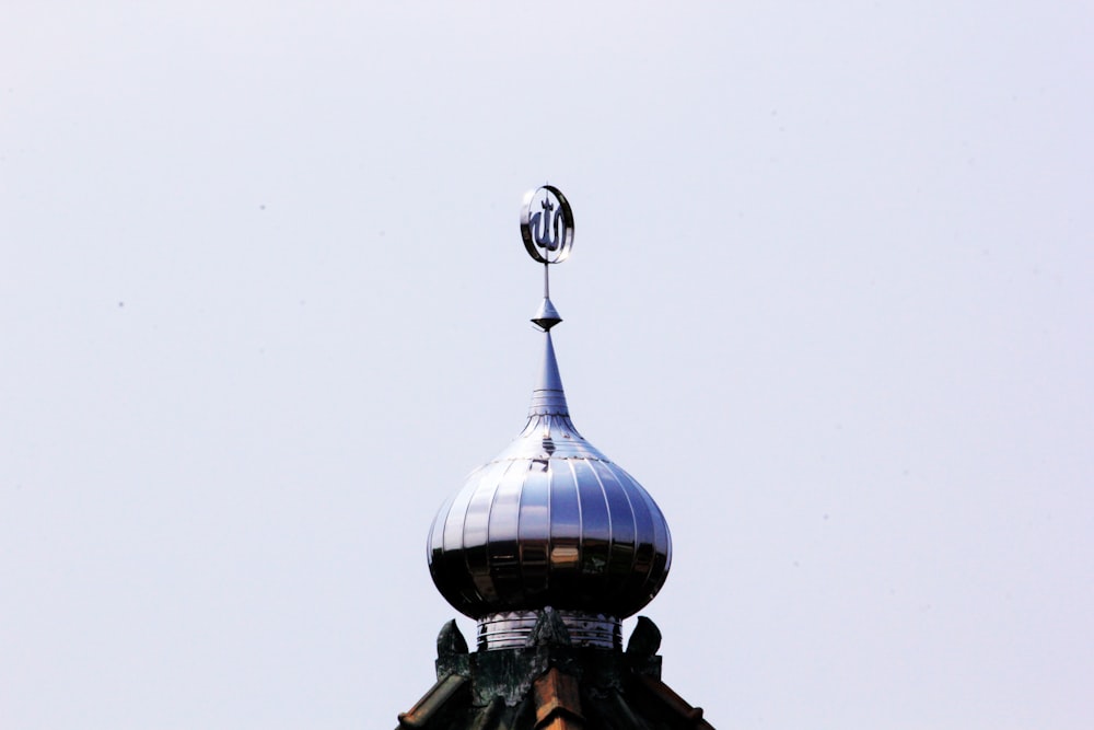 the top of a building with a clock on it