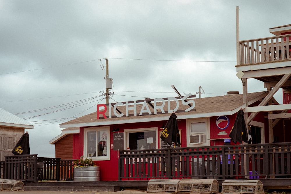 a red building with a sign that reads richard's