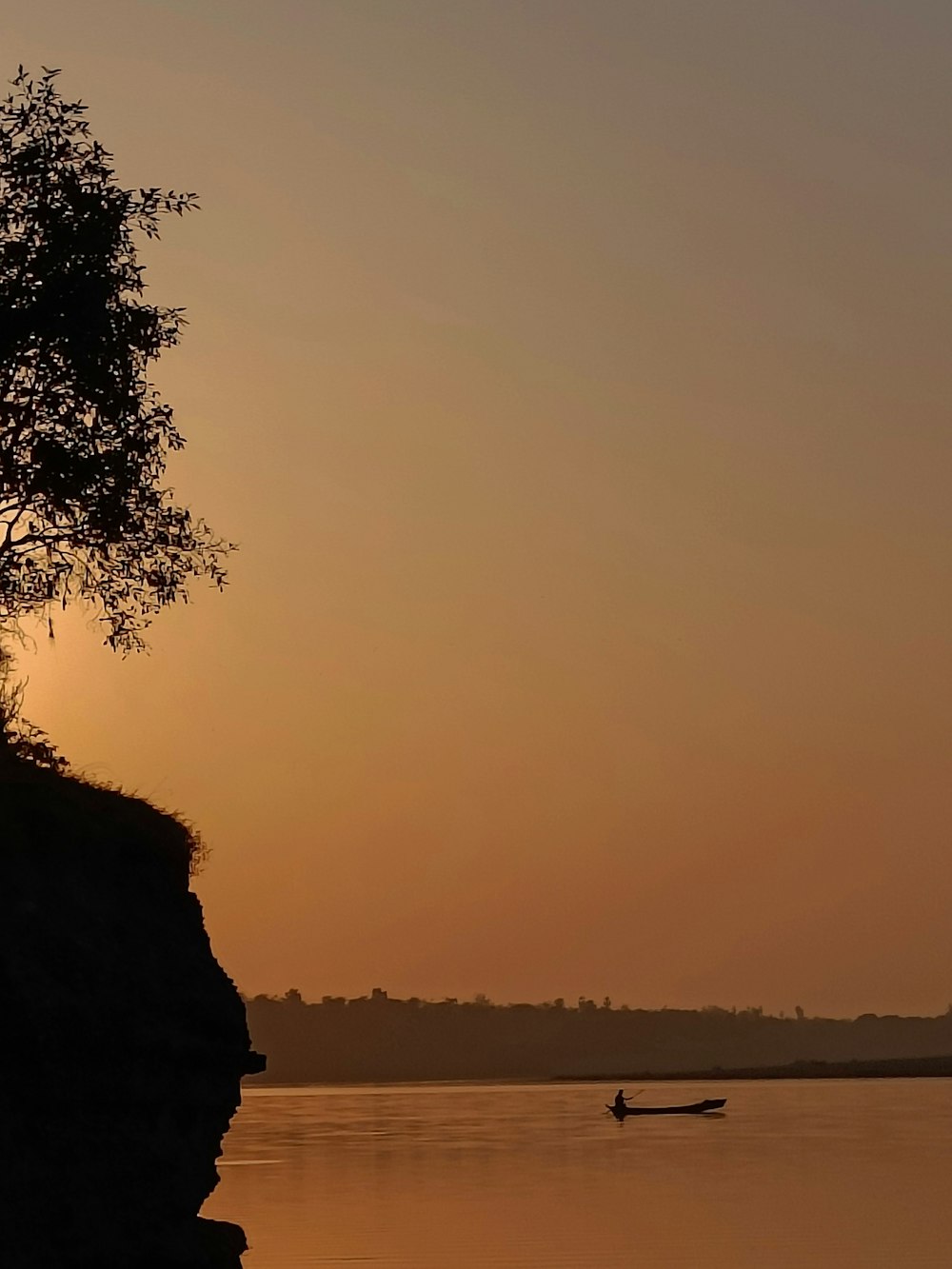 a person in a boat on a body of water