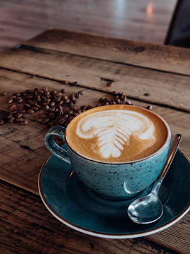 A cozy rustic Italian home blueprint spread across a wooden table with a cup of espresso nearby.