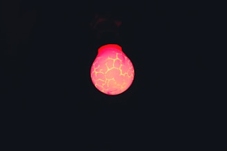 a red and yellow light in the dark
