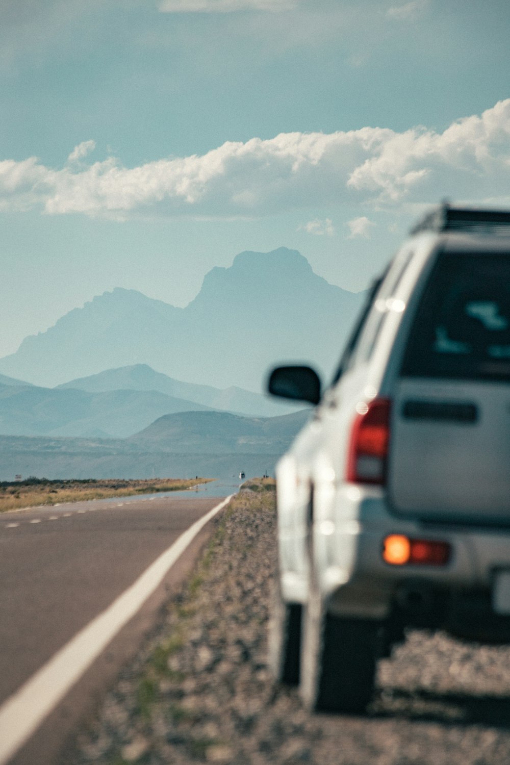 a car is parked on the side of the road