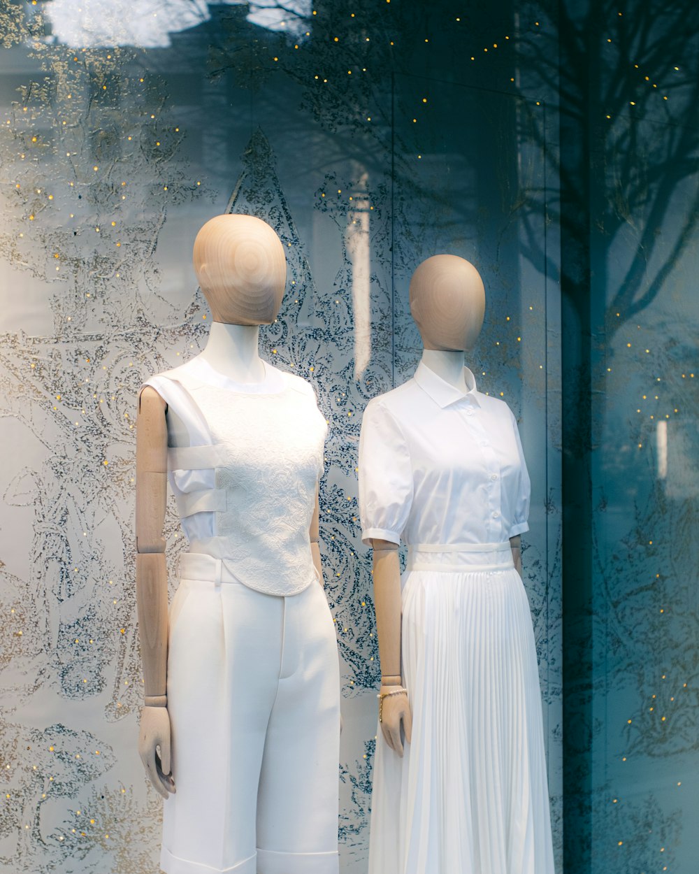 a couple of mannequins that are next to each other
