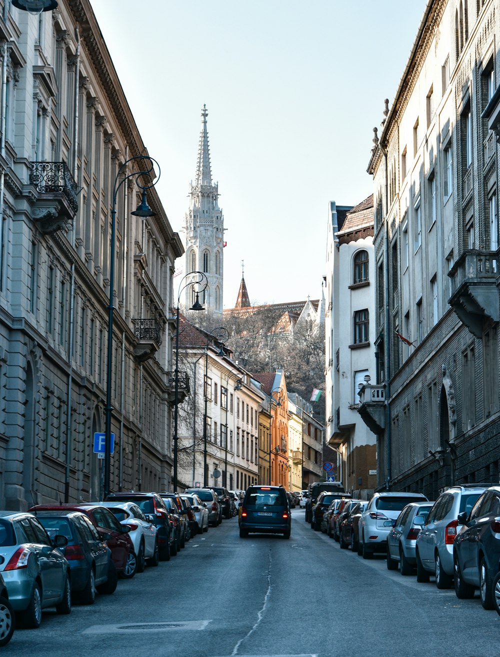 a group of people walking on a city street