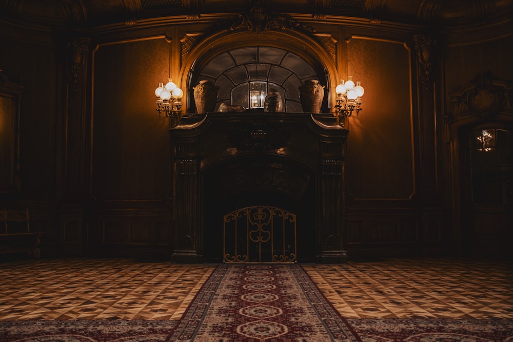 a dimly lit room with a red carpet