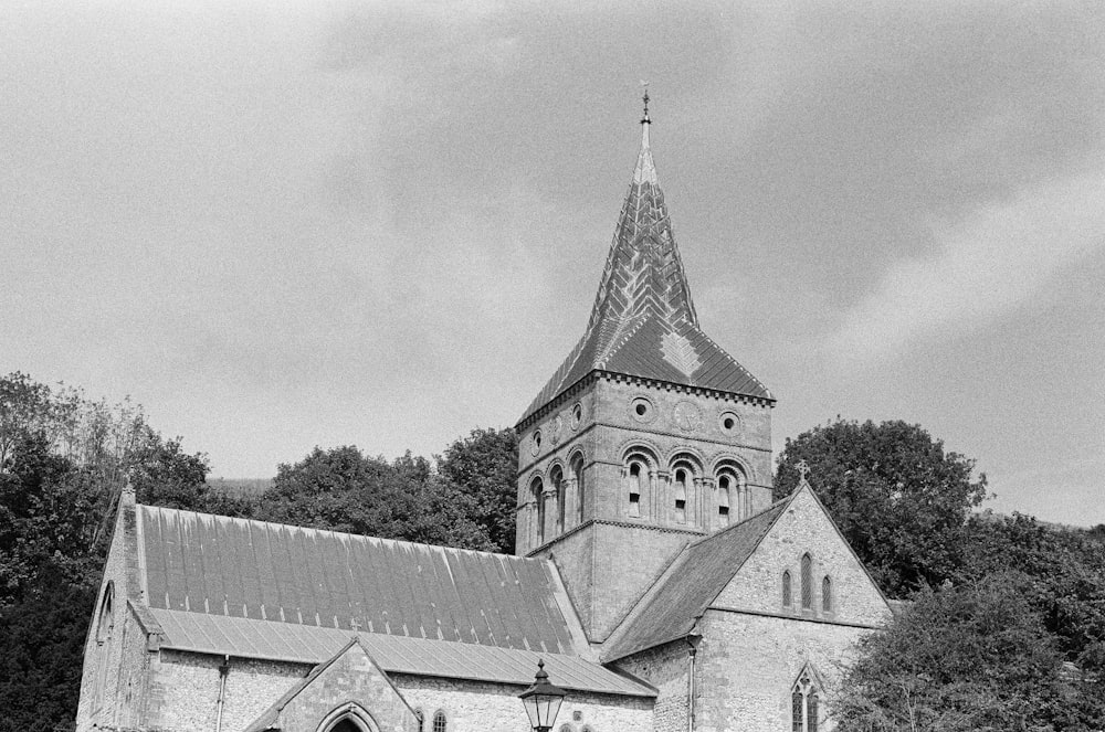 a black and white photo of an old church