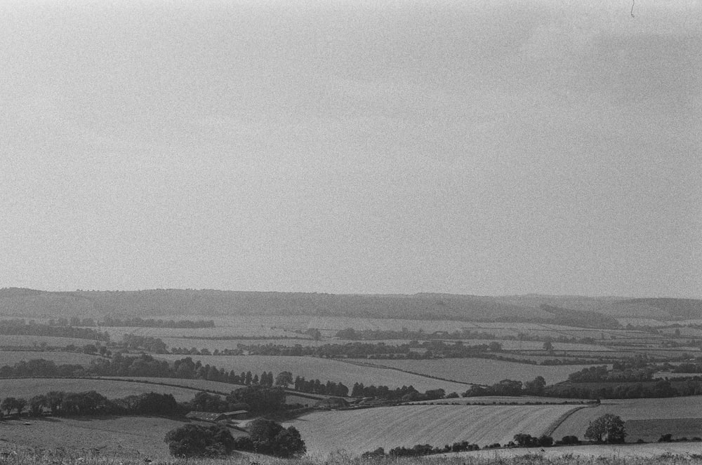 a black and white photo of a rural landscape