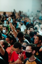 A diverse group of citizens gathered at a local town hall, engaging in community participation.
