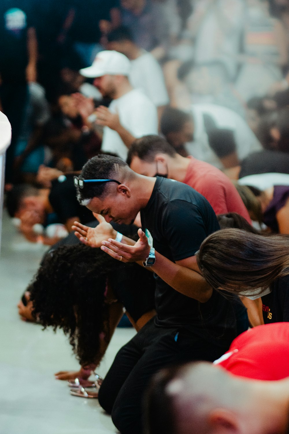 a group of people sitting on the ground