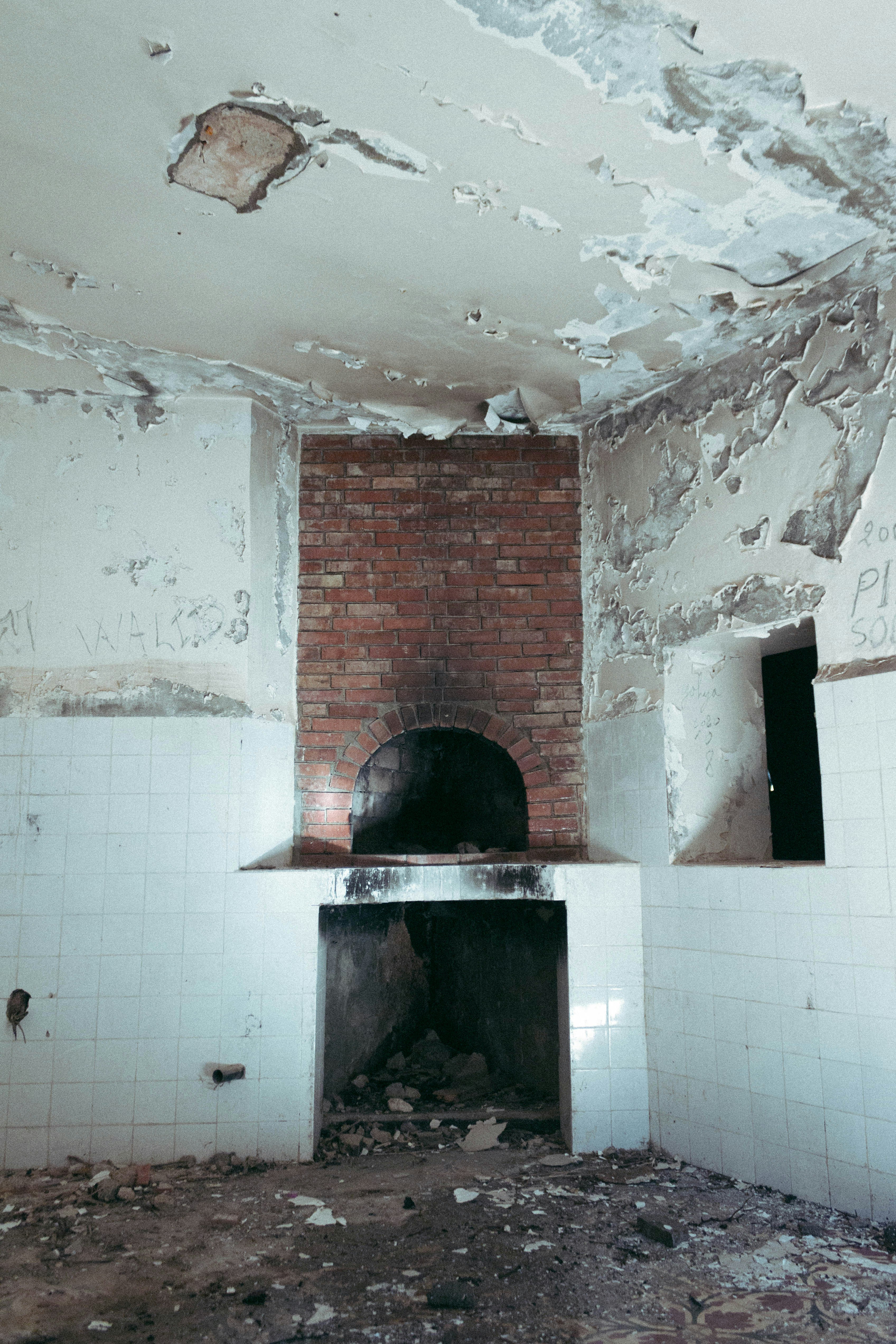 a room that has a brick oven in it