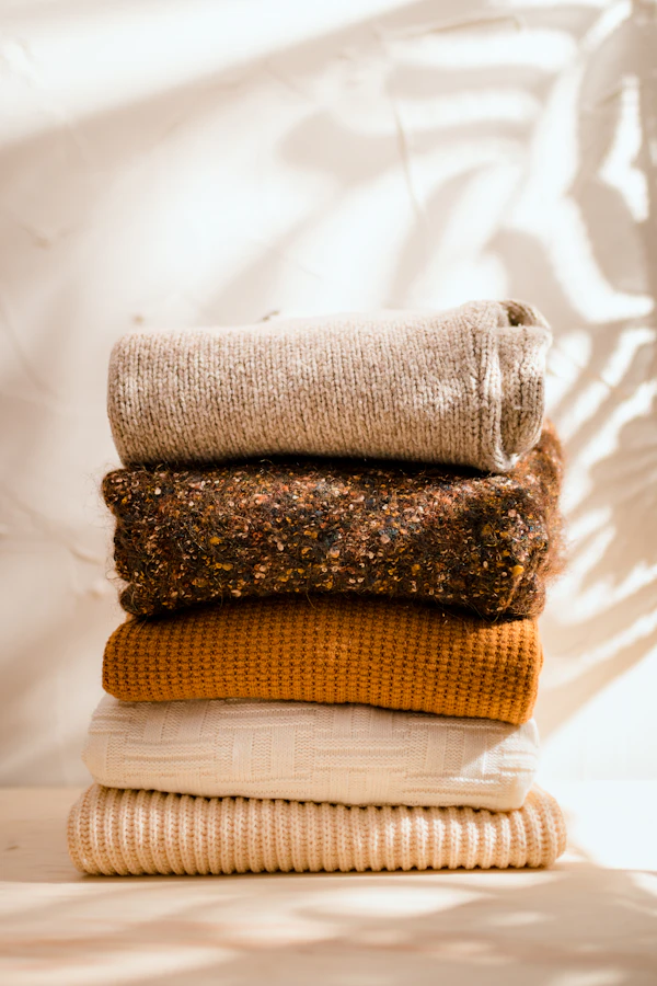 Stack of folded knitted garments
