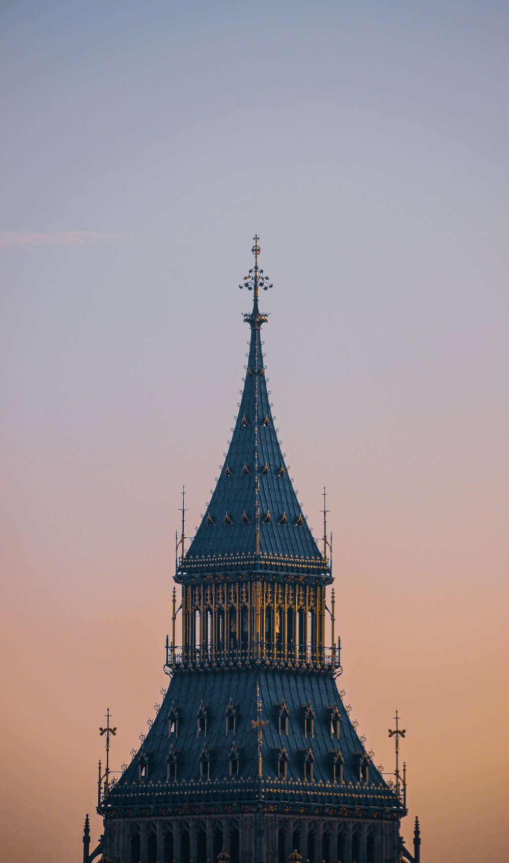 a tall building with a clock on the top of it