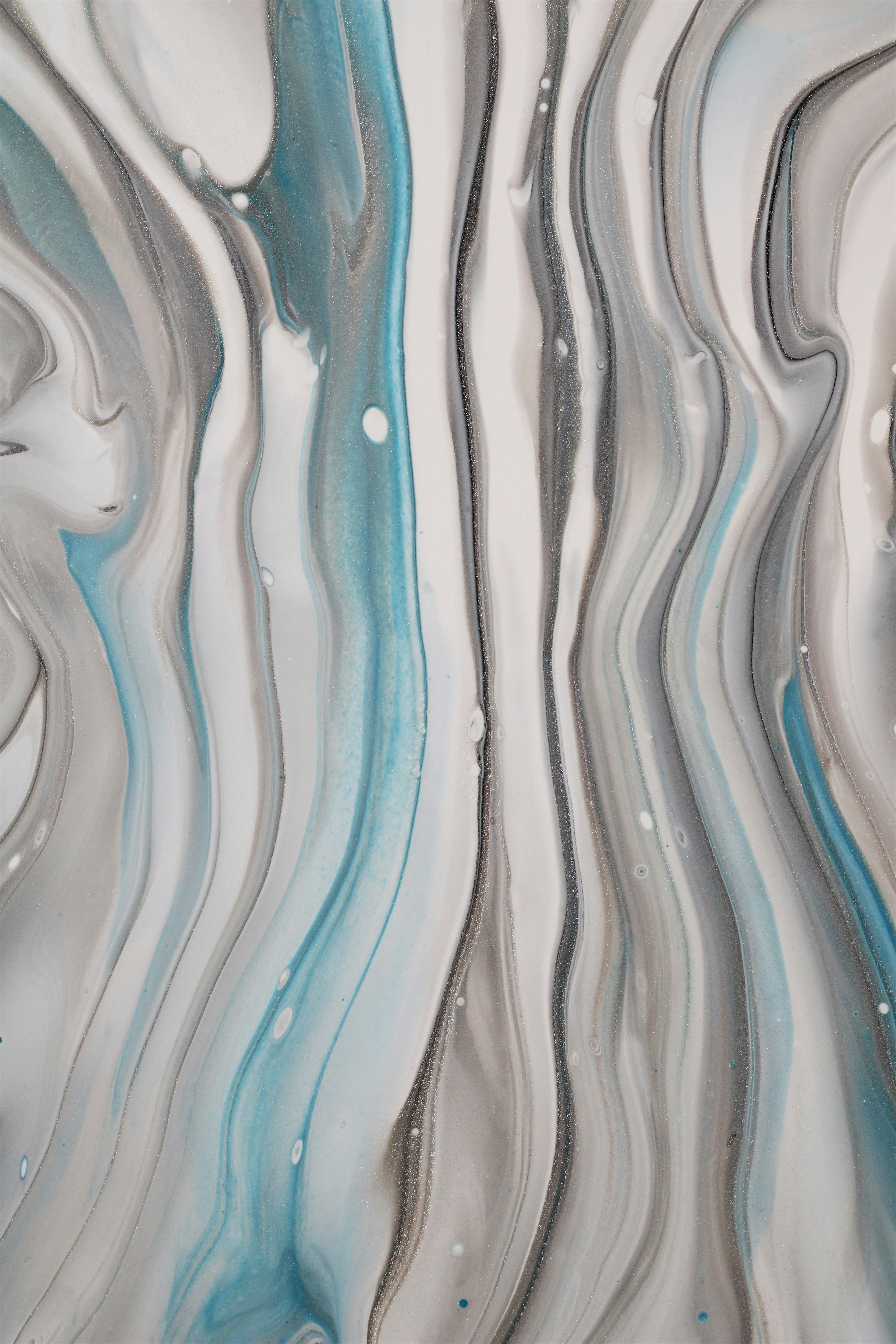 an abstract painting with blue and grey colors