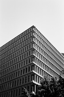 a black and white photo of a tall building