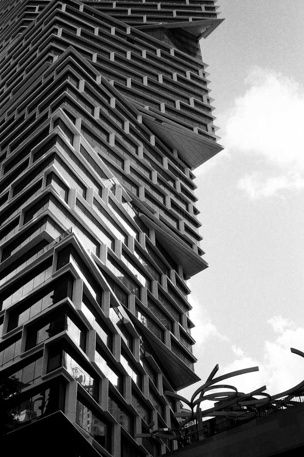 a black and white photo of a tall building