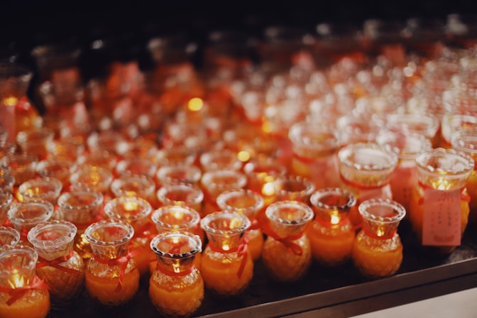 a bunch of glasses that are sitting on a table