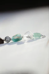 a couple of beads sitting on top of a table