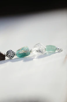 a couple of beads sitting on top of a table