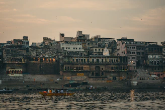 a boat floating on top of a body of water