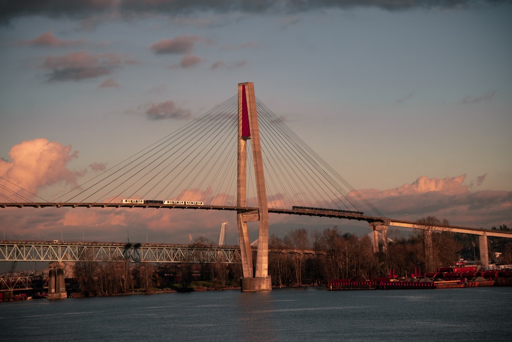 a bridge with a train going over it