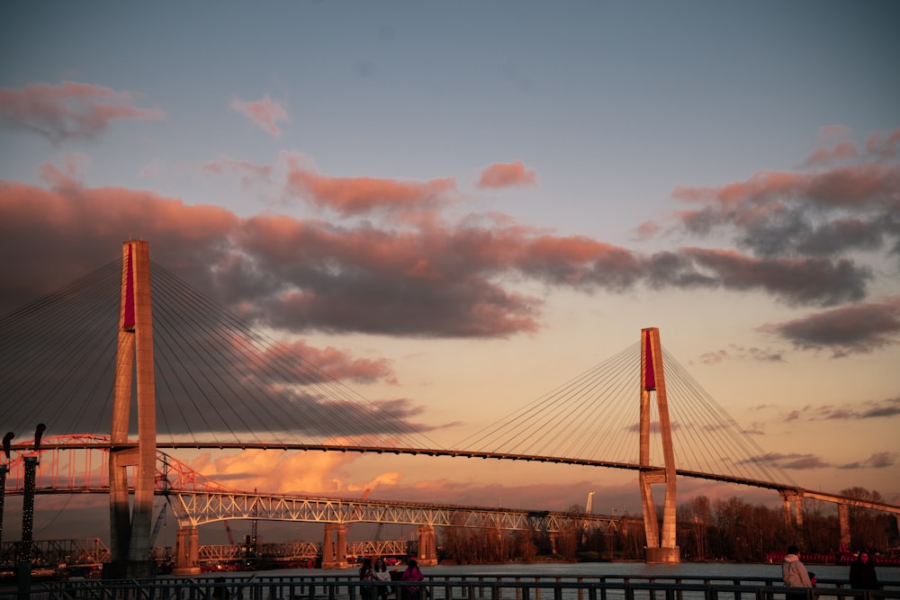 a view of a bridge from across the water