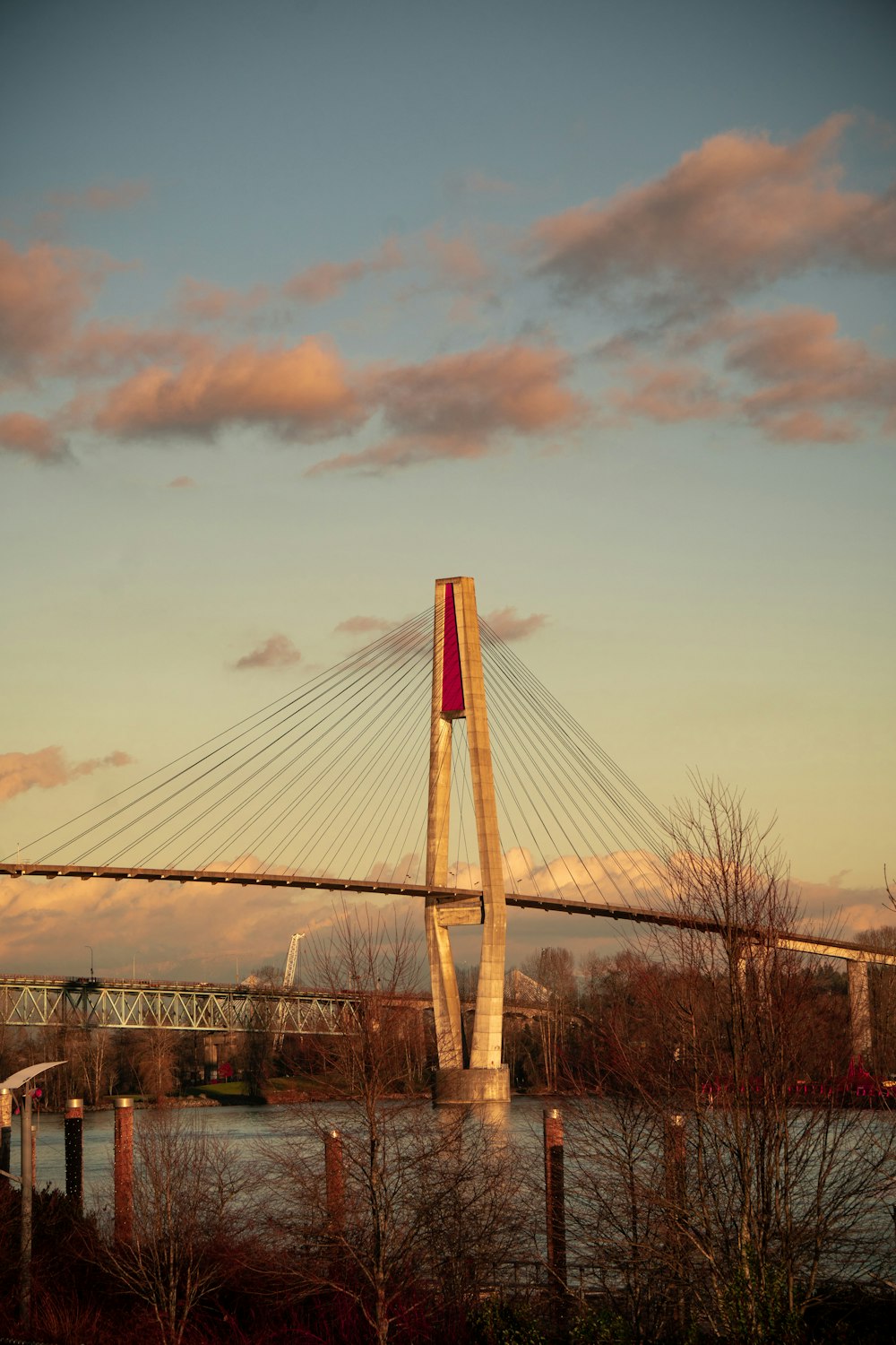 a view of a bridge over a body of water