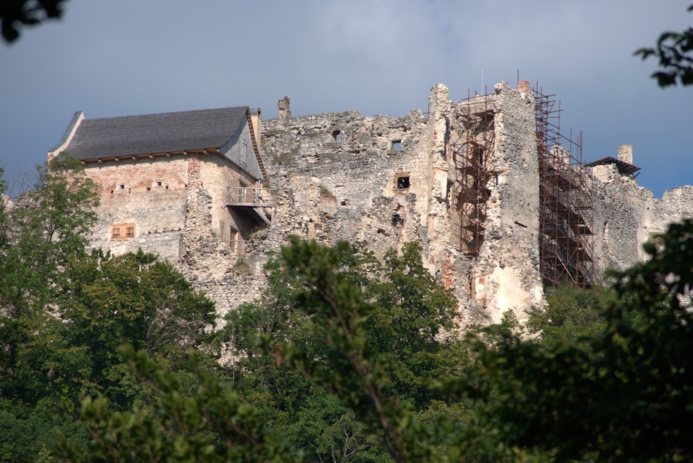 a castle with scaffolding on the side of it