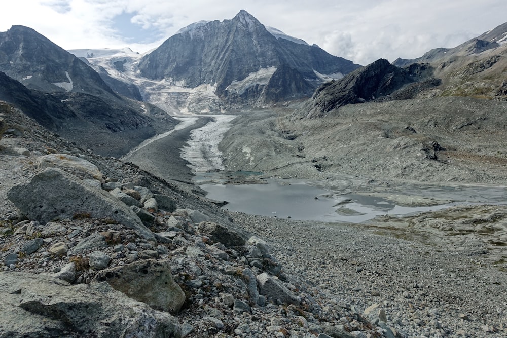 a view of a mountain range with a glacier in the distance