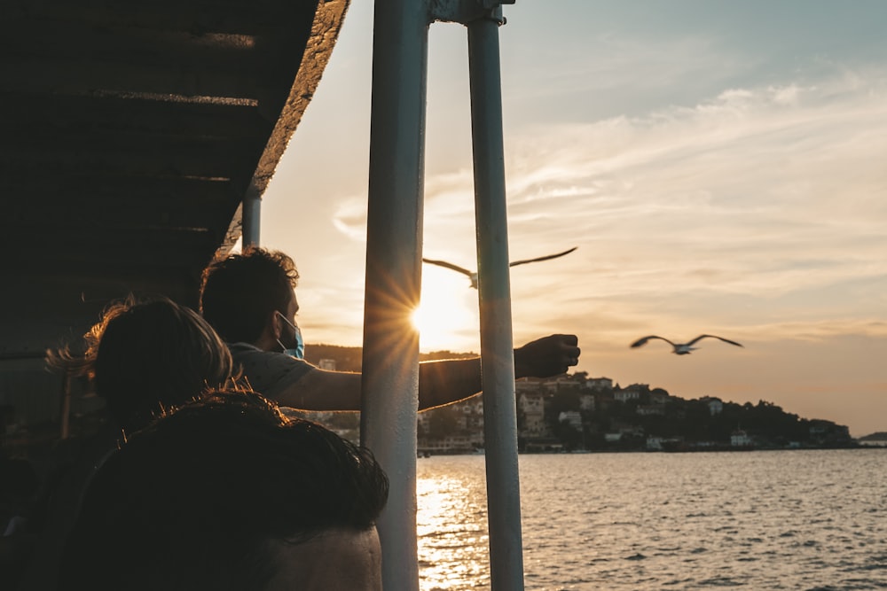 a couple of people that are on a boat