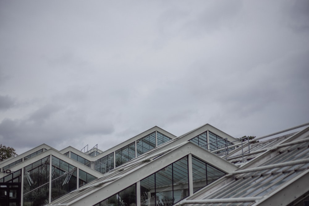 a group of glass buildings sitting next to each other