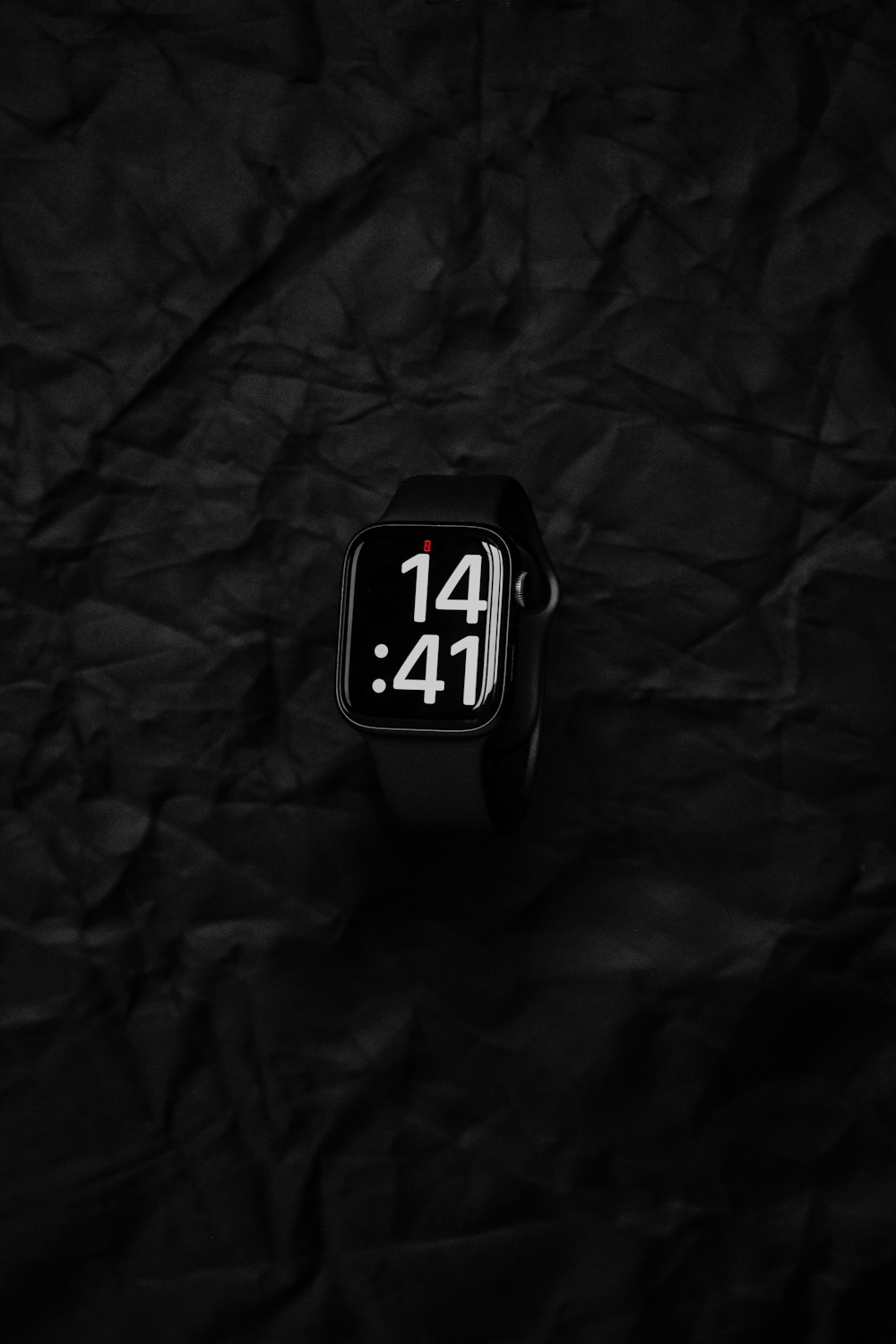 an apple watch with the time displayed on it