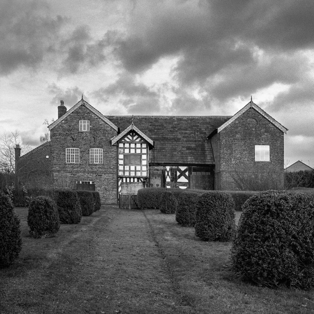 a black and white photo of a house