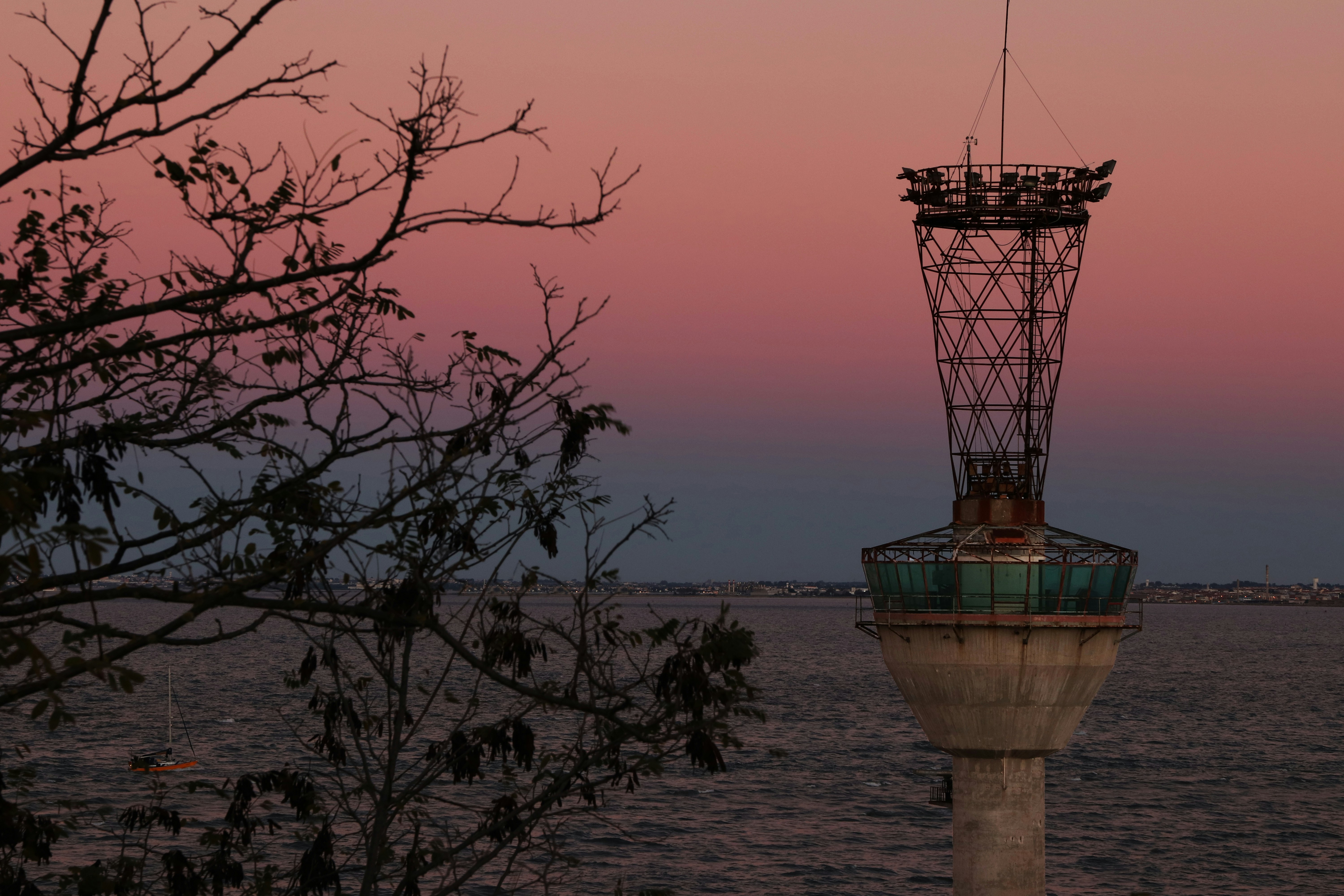 a tower sitting on top of a large body of water
