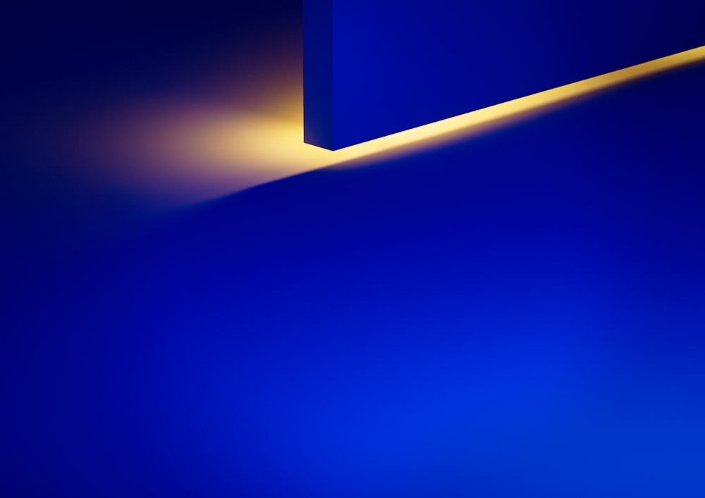 a blue wall with a yellow light coming from it