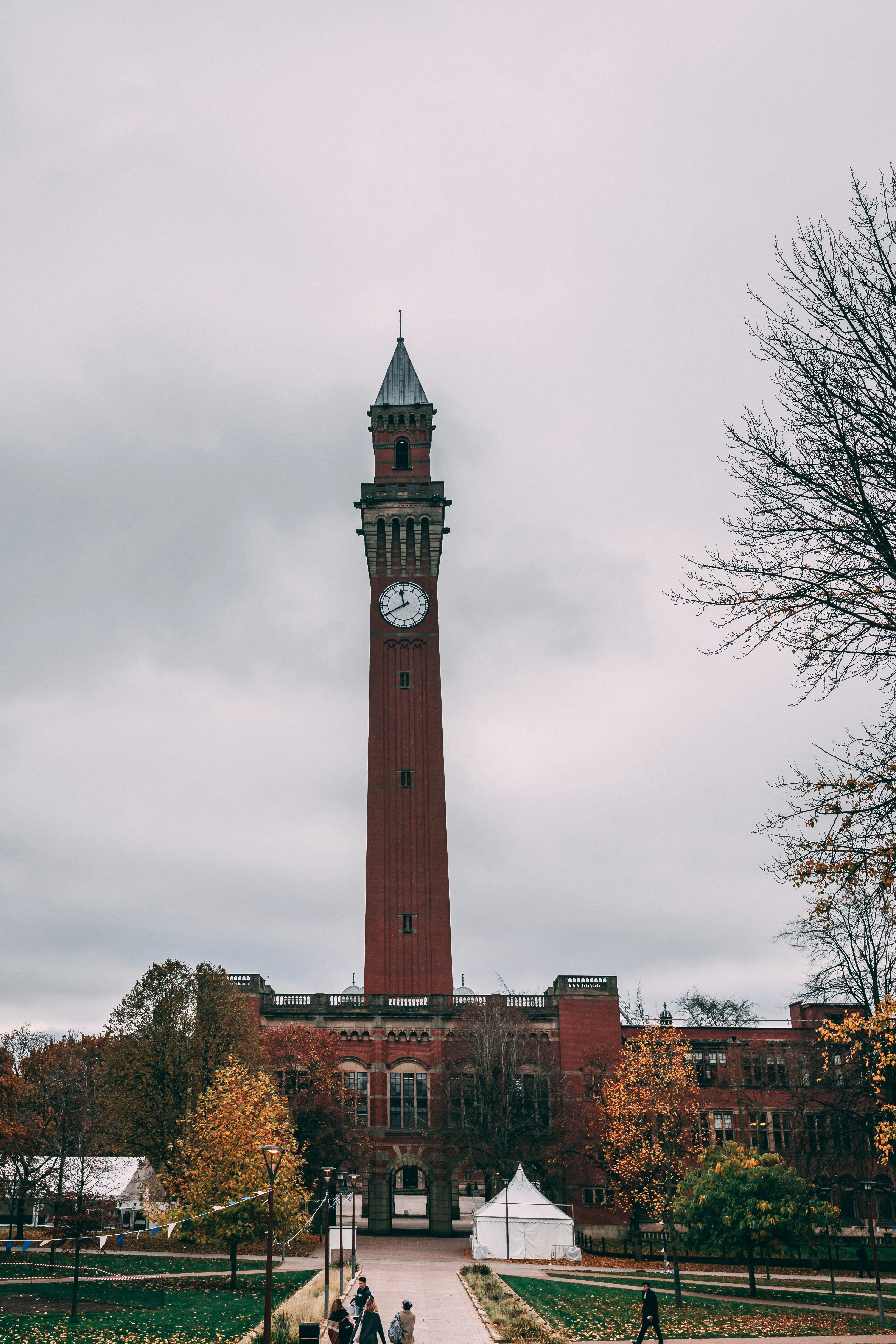a tall tower with a clock on top of it