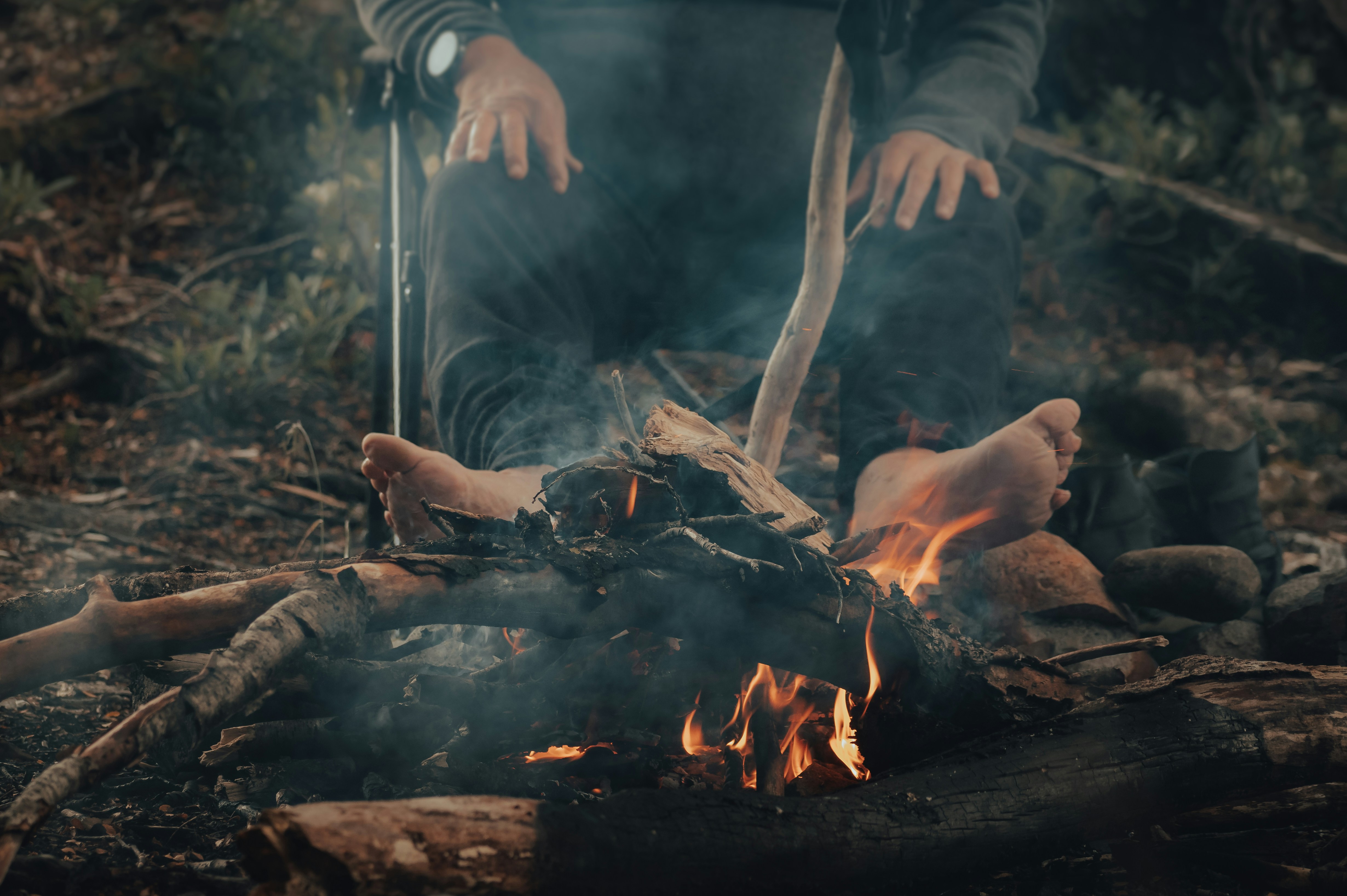 Person wearing heated socks while hunting in the woods
